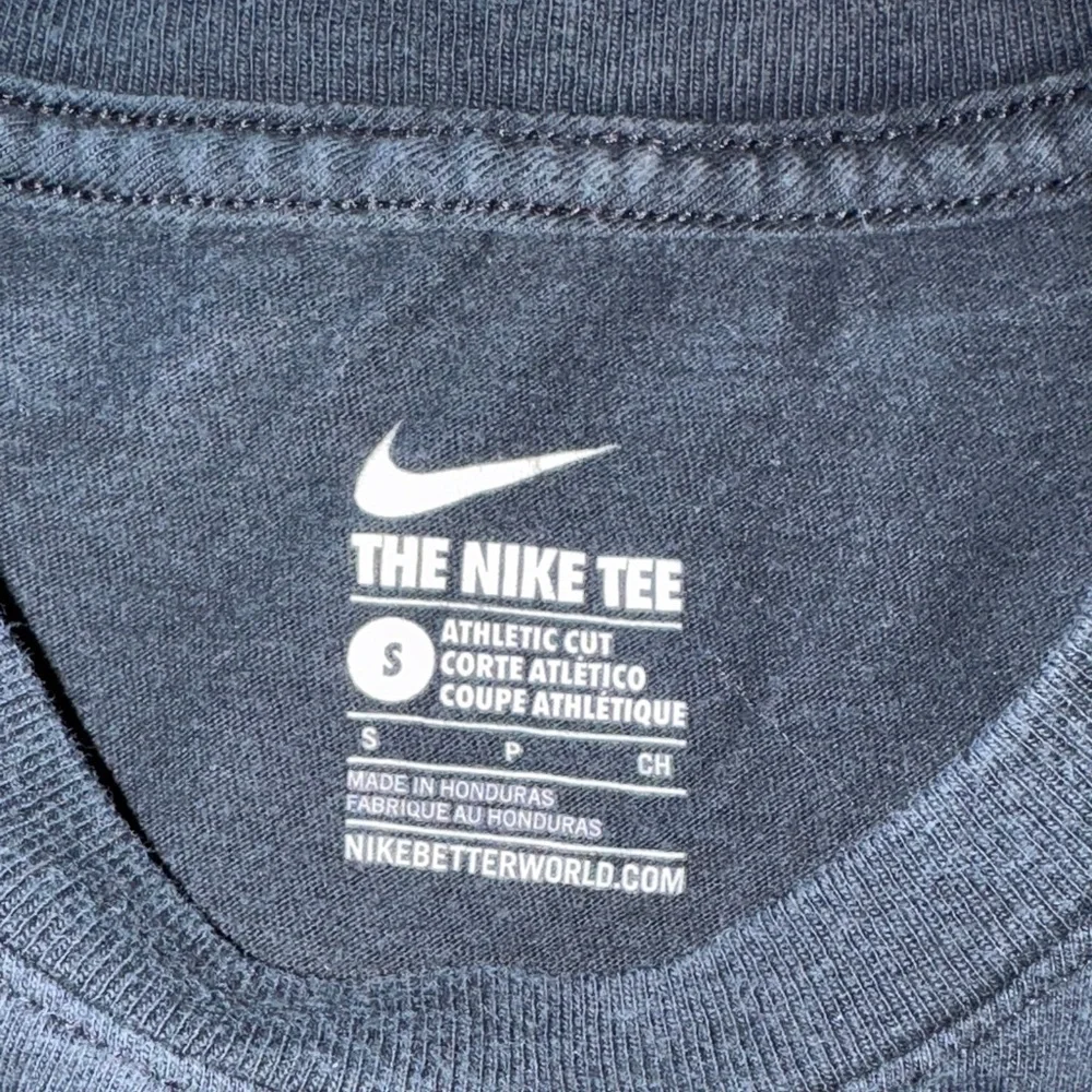 Gently loved Nike Kids Black T-Shirt with White Swoosh
